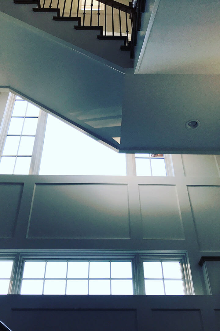Whole Home P1 view of high ceiling with staircase